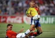 7 Jul 1998:  Holland captain Frank de Boer brings down Ronaldo of Brazil during the World Cup semi-final at the Stade Velodrome in Marseille, France. Brazil went through on penalties. \ Mandatory Credit: Stu Forster /Allsport